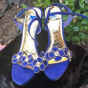 Royal blue high heel shoes in good condition. Never been worn